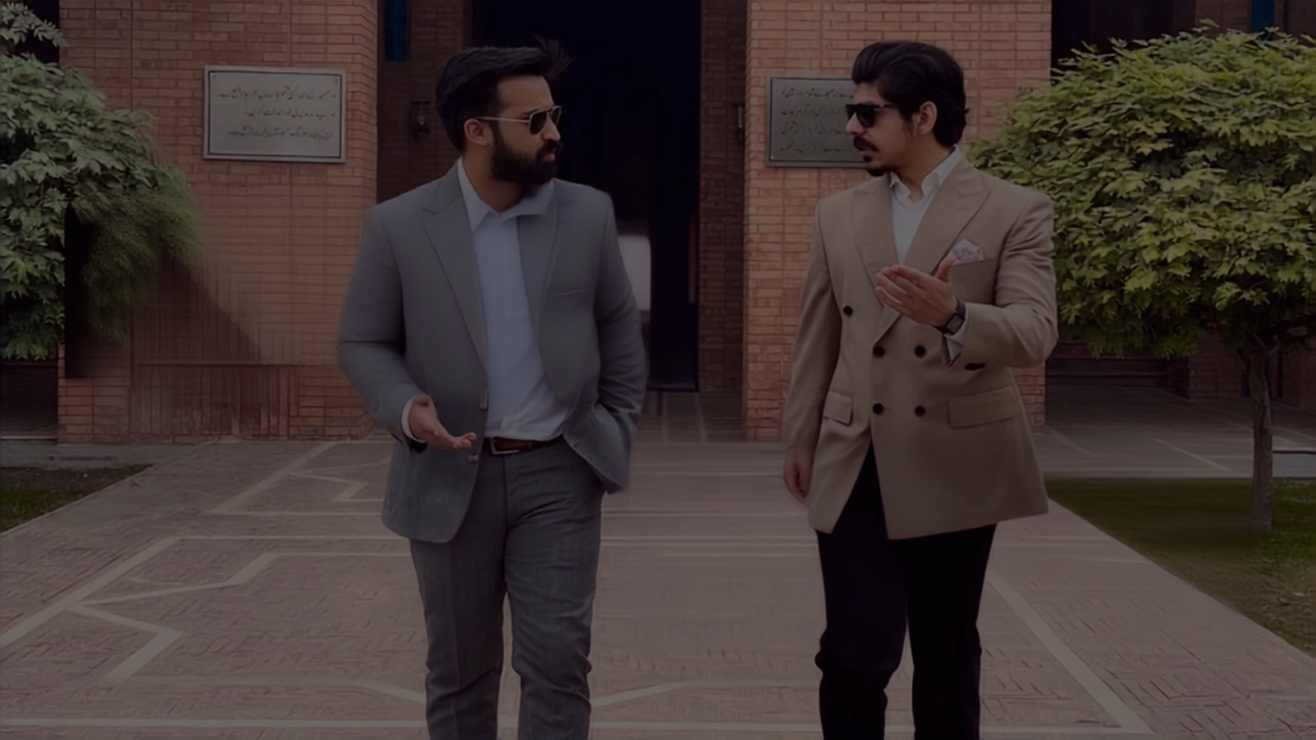 Gold-Stellar's founders walking outside the Lahore office